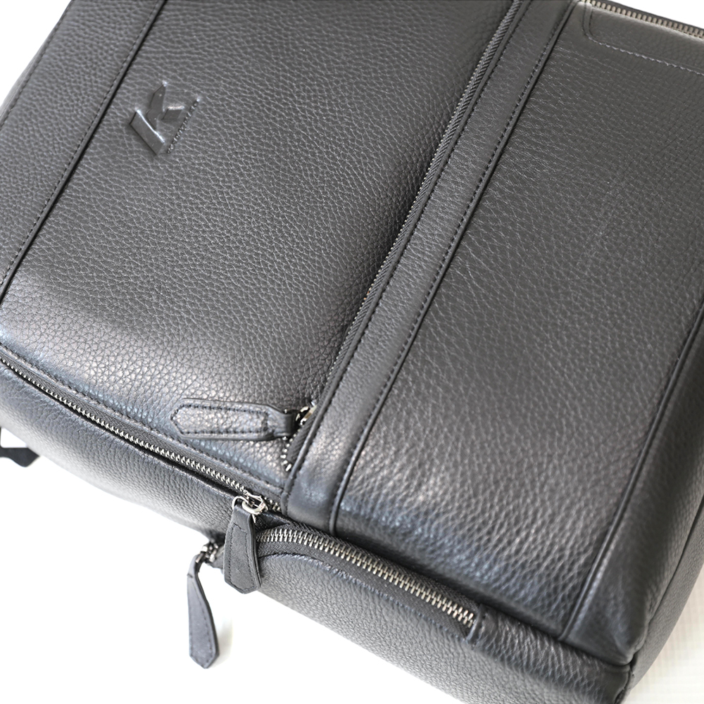 Classic Leather Woman's Men's Backpack with Side Pockets